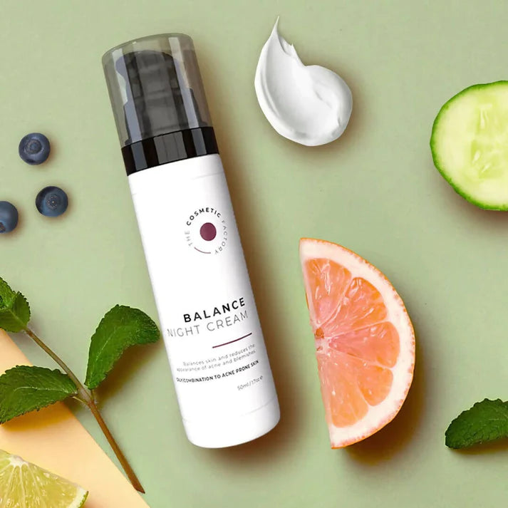 a jar of balance night cream 50ml next to fruits.