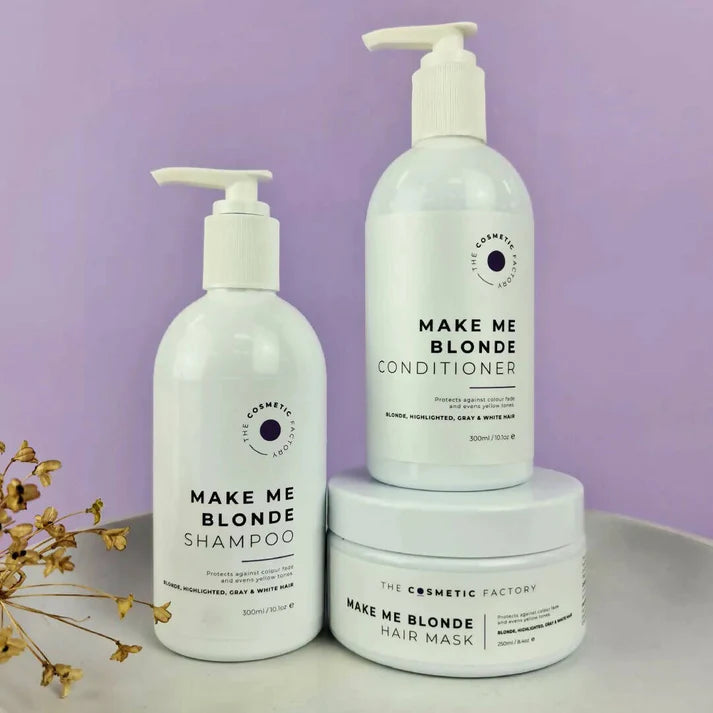 bottles of make me blonde hair mask 250ml on a purple background.