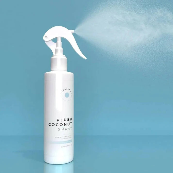 a bottle of phyto day cream 50ml on a blue surface.