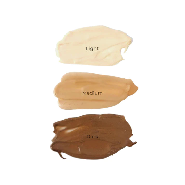 a bottle of touch & glow body foundation 200ml on a yellow background.